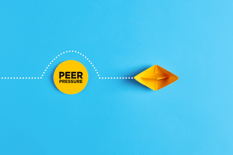 Paper boat overcomes the obstacle of peer pressure. To avoid or to deal with peer pressure concept.